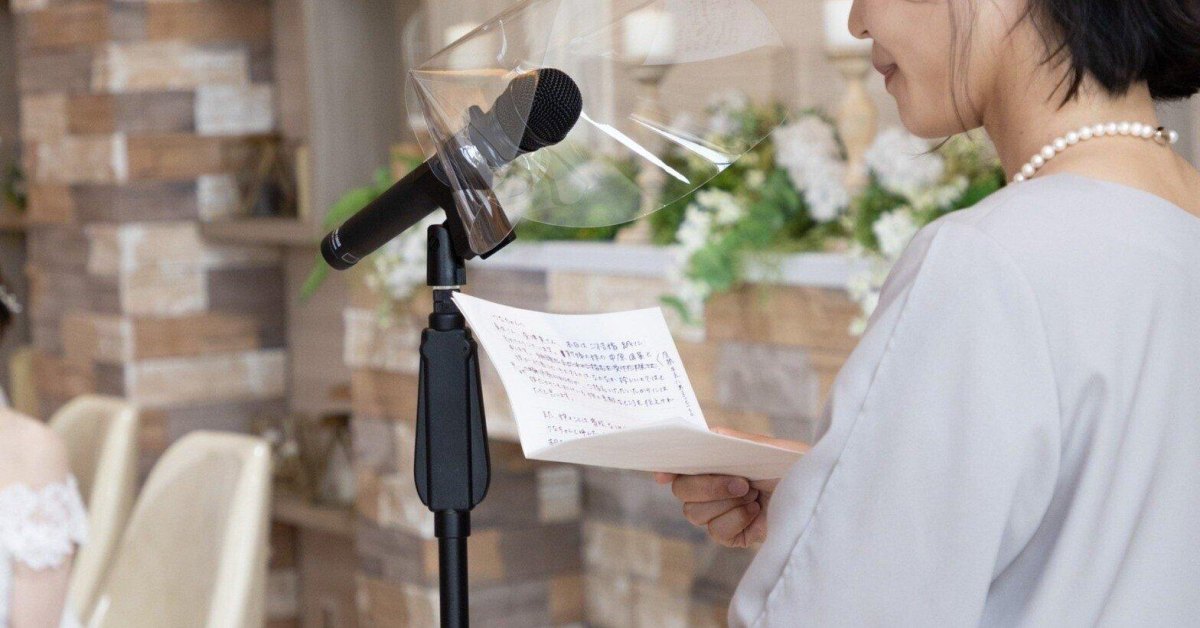 Wedding speaker preparing notes