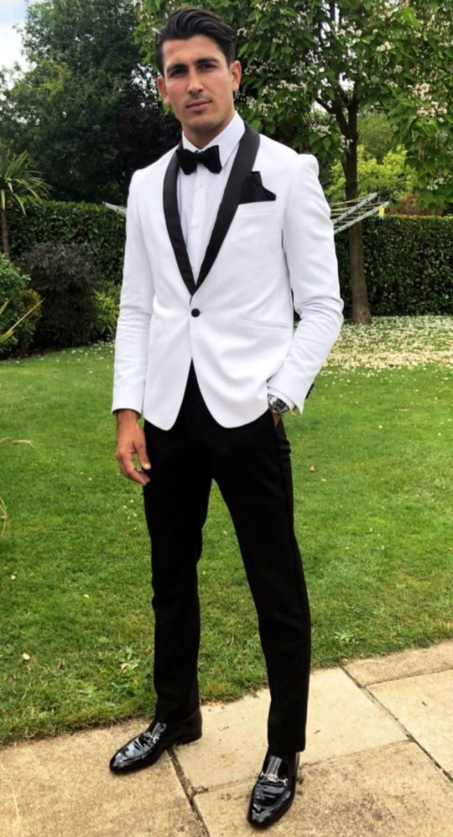 Black and white wedding guest outfit men