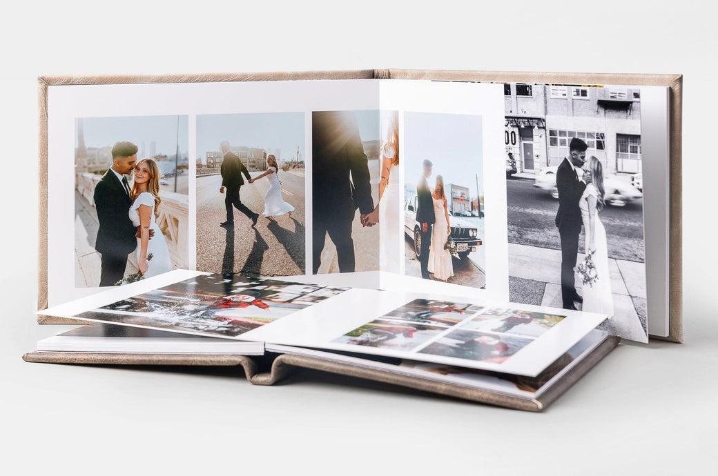 Wedding album displaying printed photographs from a celebration