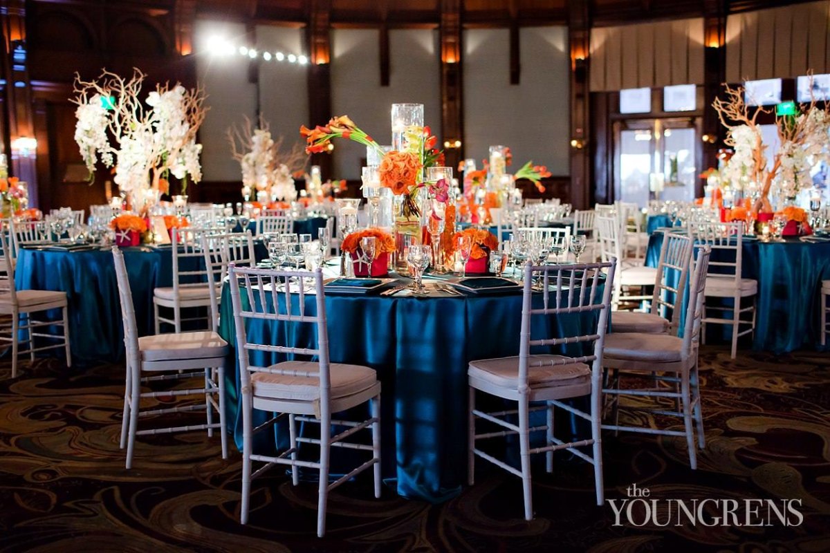 Deep teal amber fall wedding decor