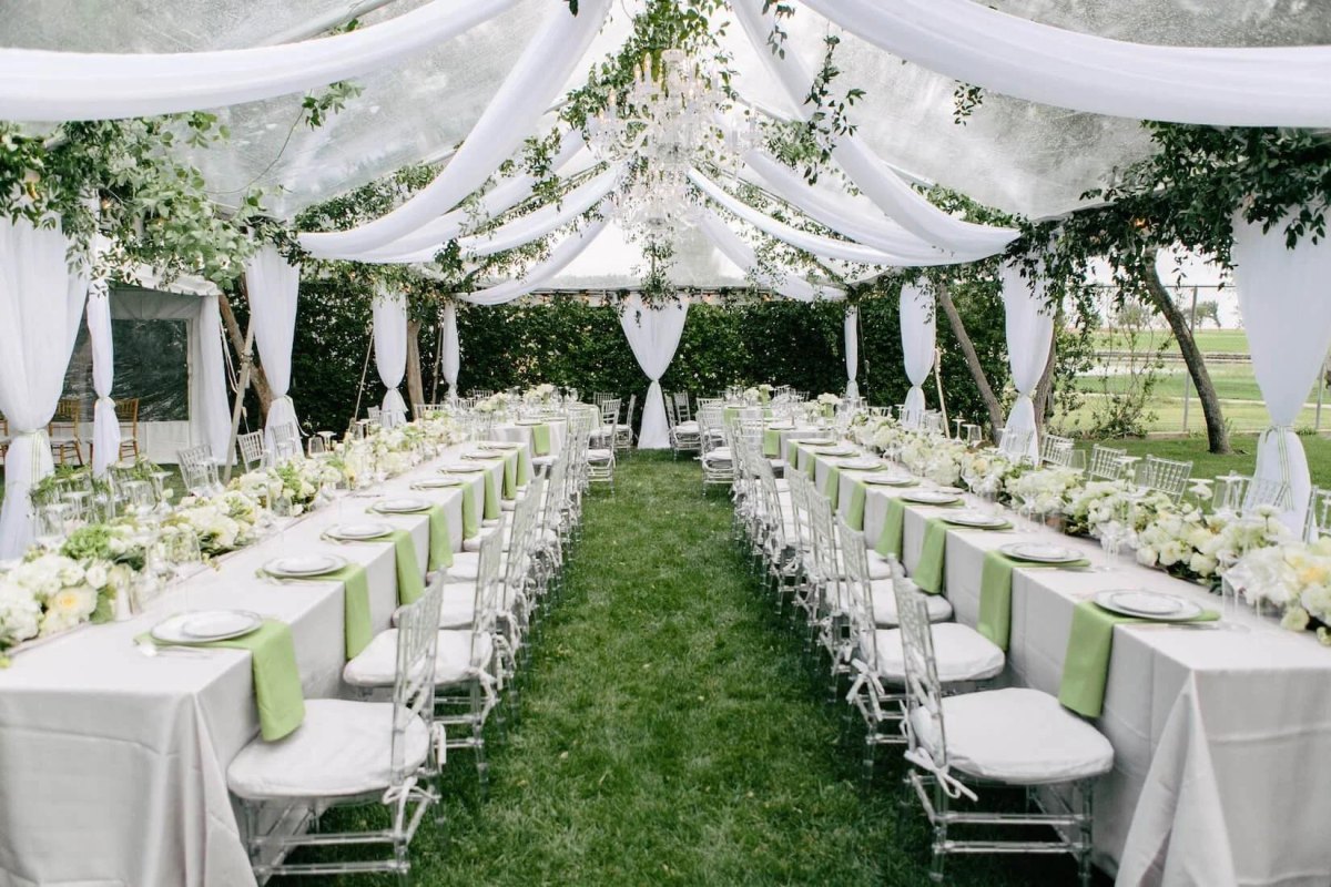 Elegant draped wedding tent decor