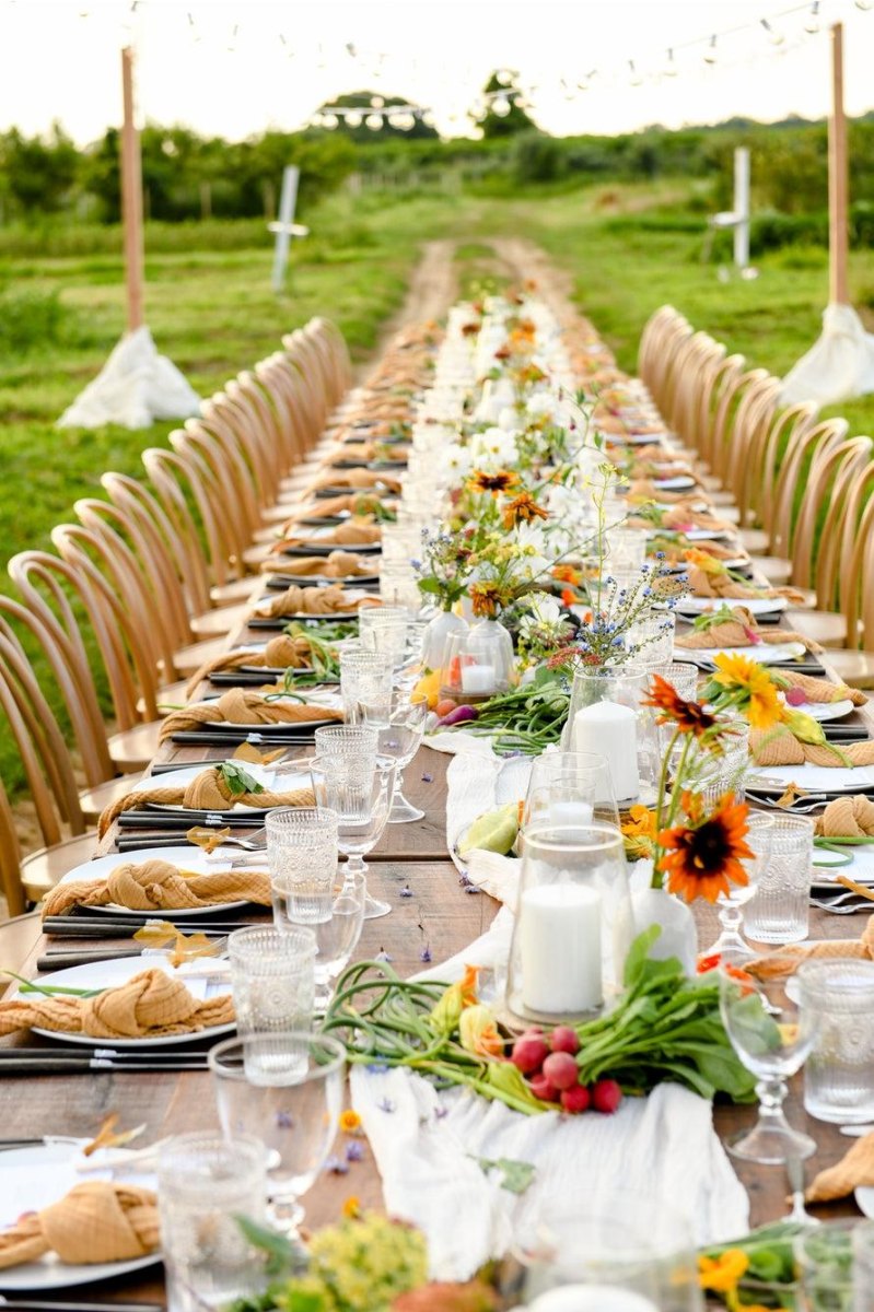 Farm table wedding dinner setting