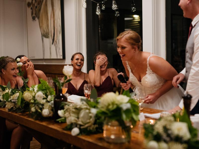 Bridesmaids sharing funny stories