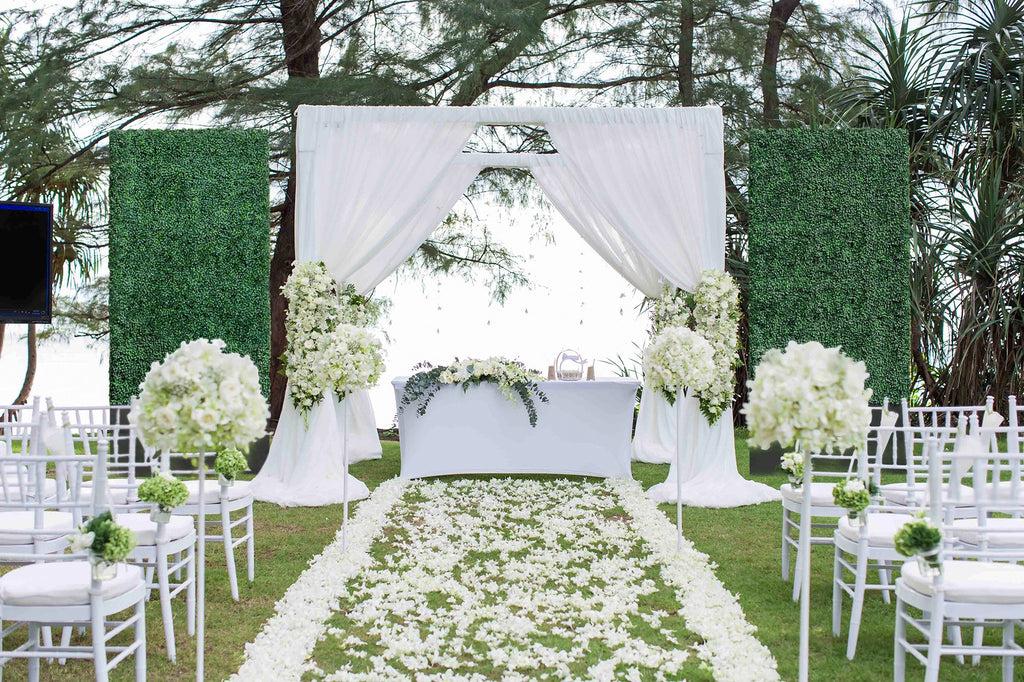 Greenery wedding backdrop outdoors
