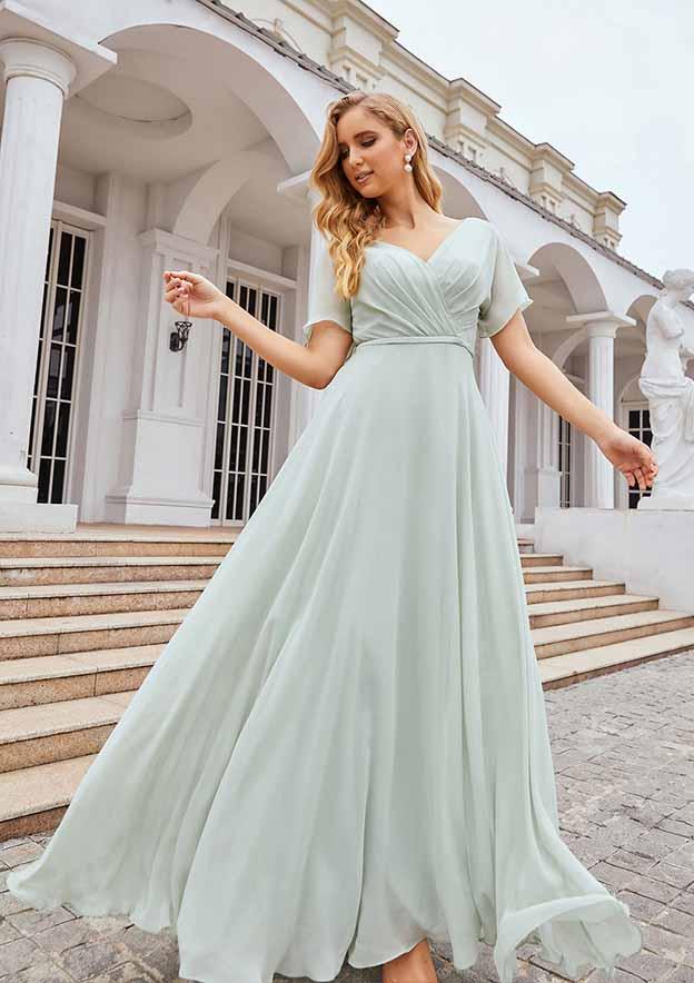 Light green chiffon bridesmaid dresses with flowing skirts