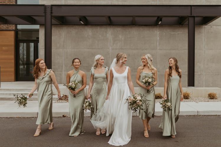 Minimalist green bridesmaid dresses at a modern wedding