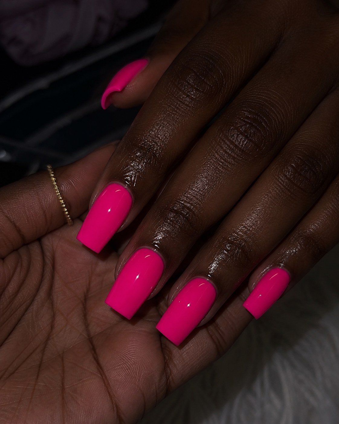 Solid opaque hot pink square nails, a classic bold neon nails for dark skin choice