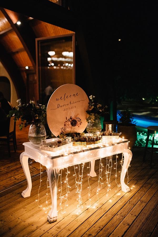 Romantic candlelit wedding welcome table