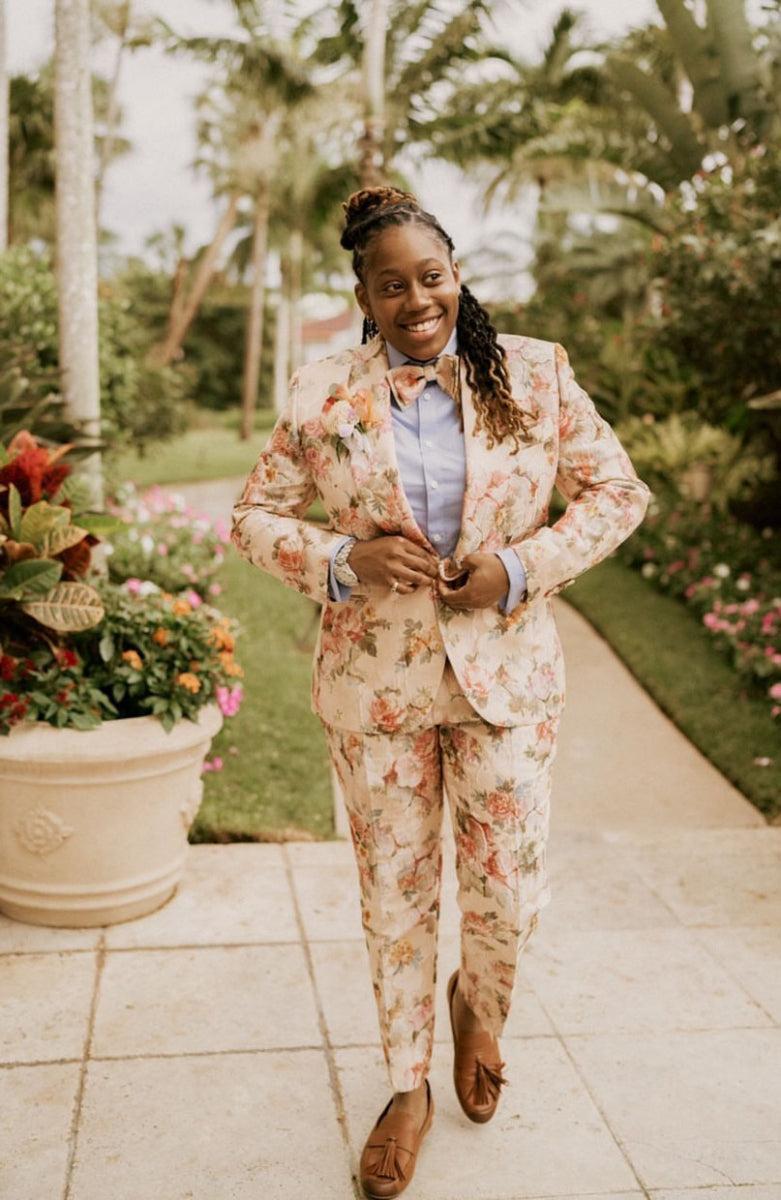 Sophisticated floral suit wedding guest