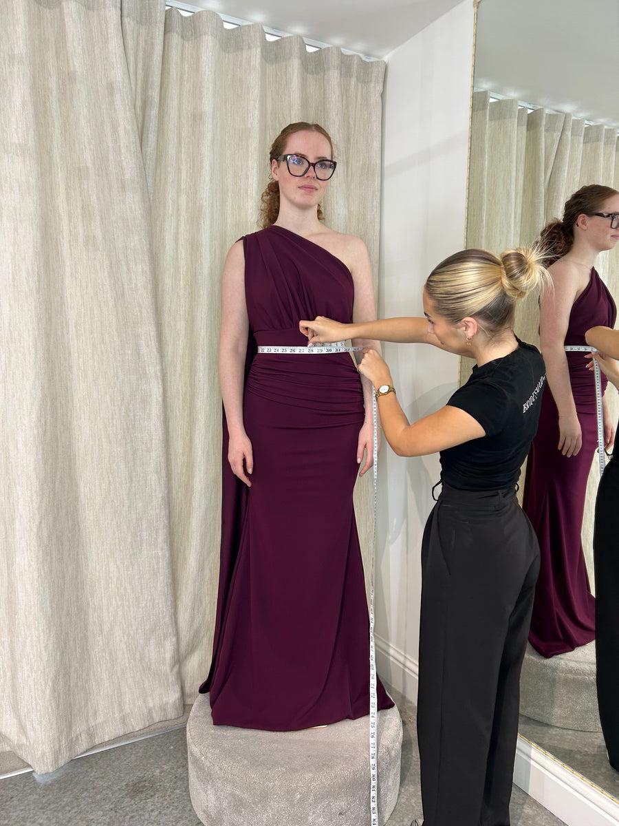 Measuring bridesmaid for dress