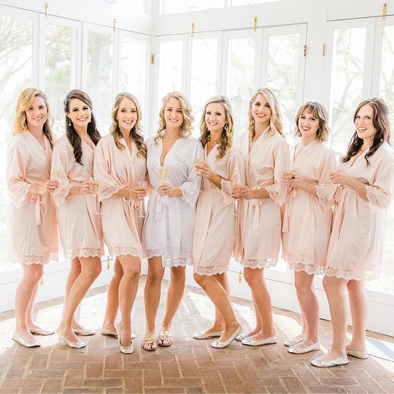 Bridesmaids wearing matching wedding robes