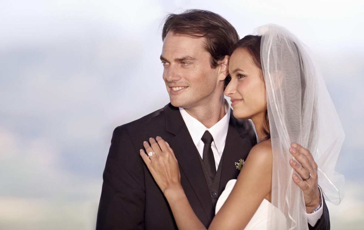 Newlywed couple looking ahead
